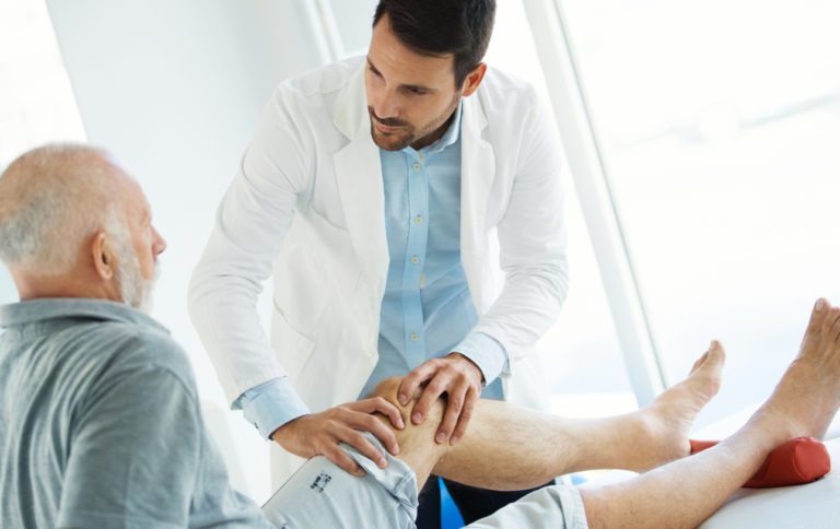 Doctor consulting Knee Osteoarthritis patient