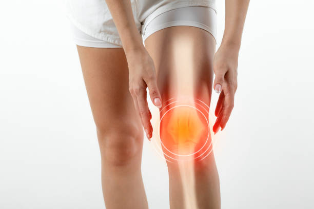 Woman suffering from pain in knee