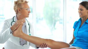 Ankle sprain examination by Sports Medicine Specialist