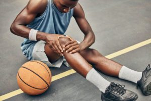 Fitness, basketball player knee injury